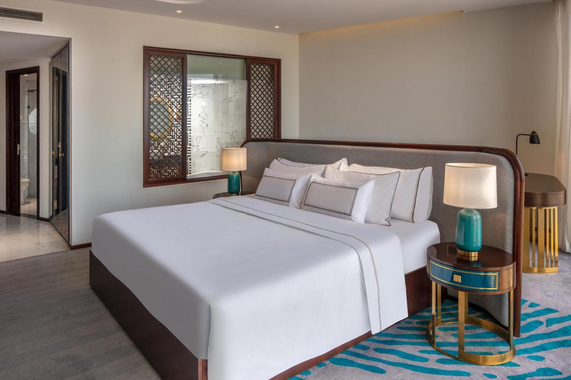 เมเลีย วินเพิร์ล เว้ Hotel ห้อง รูปภาพ A bedroom at the hotel